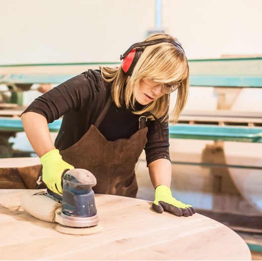 worker sanding table